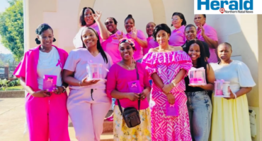 A group image of Vryheid Young Women’s Manyano members, all dressed in pink for breast cancer awareness.
