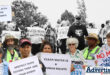 Newcastle West residents during a march in Newcastle brandishing posters.