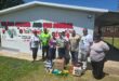Image of people donating food stuff to a creche in Dundee.