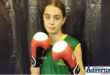 Zonica Booÿse, a young Kickboxer in her gear.