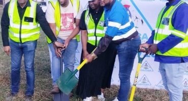 Image of Dannhauser municipal officials holding spades for a sod turning ceremony.