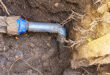 Image of a water meter and pipe.