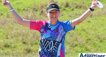 Mardy Conradie shows a thumbs up while doing parkrun in Newcastle.