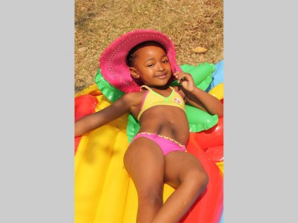 Rorisang Mothupi relaxes in the sun.