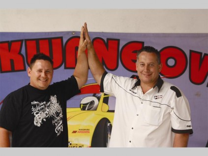 Allas Pienaar and Stephan Weideman share a high five on their success so far at the national oval championship in the hot rod class. They are currently in second and third place respectively.