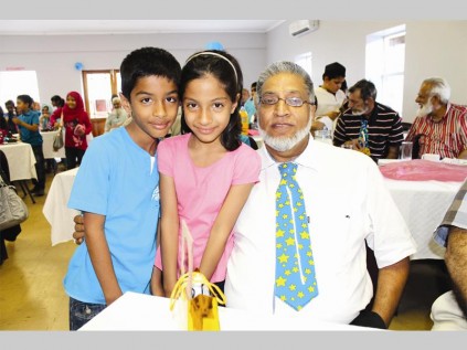 Raees Bhikoo and his sister, Raeesa are very excited that their grandfather, Arif Muhammed travelled all the way from Zambia to celebrate Grandparents' Day with them.