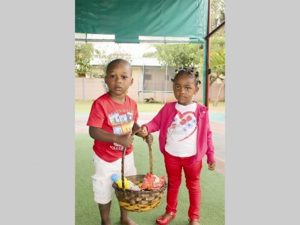 Timmy Utuzi and Bokang Masegela say they can't wait to try the delicious food on Valentine's Day at the Share Joy Day Care picnic.
