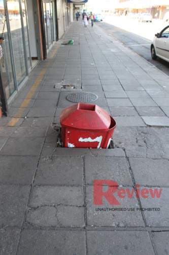 Store managers and owners in the central business district of Polokwane are using unused municipal rubbish bins to close open manholes, in order to prevent accidents from happening.