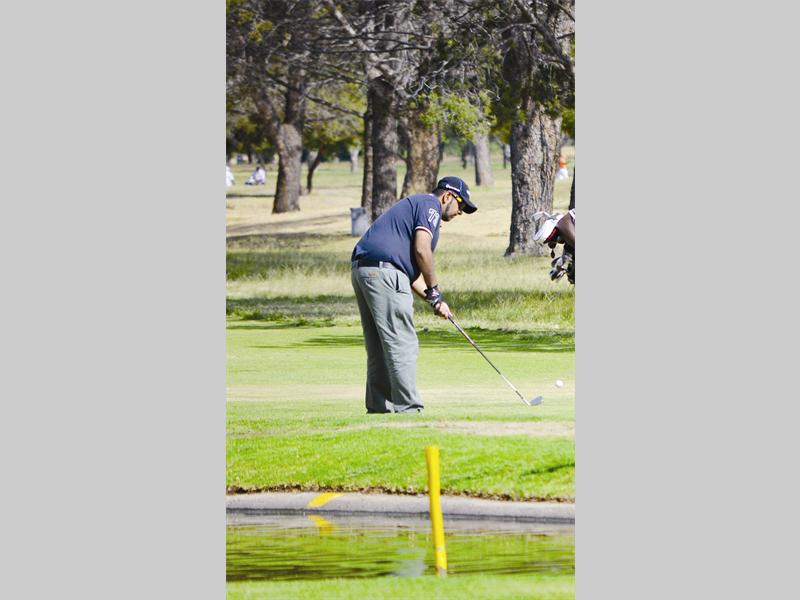 Anver Ayob aims for the hole during the Mike's Chicken Monthly medal golf challenge.