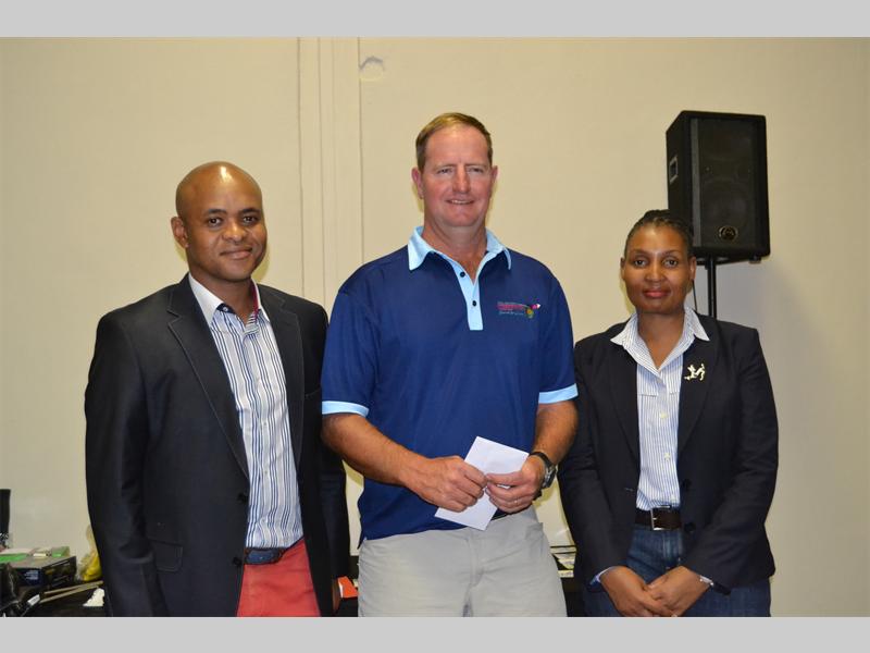 Richard Schullenburg won the prize for being nearest to the pin on the 11th hole during the Polokwane Chamber of Business golf day last Friday. With him is the chamber's president, Siphiwe Mdlalose (left) and Polokwane Thembi Nkadimeng.