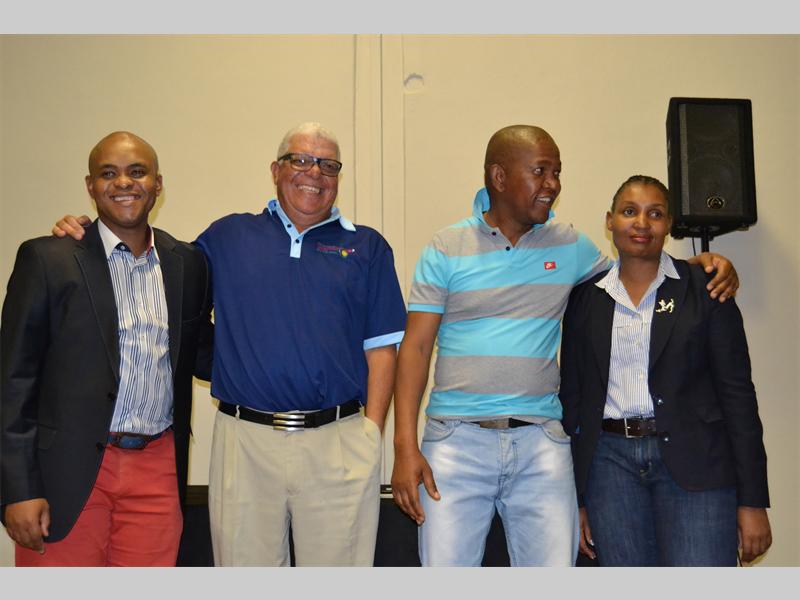 Joe Mackays and Baldwin Ramasobane receive their prize for second place during the Polokwane Chamber of Business golf day prize giving ceremony. With them are chamber president, Siphiwe Mdlalose and Polokwane mayor Thembi Nkadimeng.