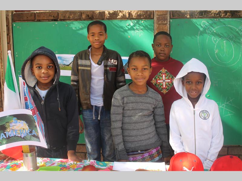 At the South American table is Munei Kutama, Nomvula Twala and Kelebogile Lekote. At the back are Jacob Semeo and Refentse Malatji.