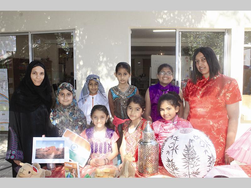 Asia's heritages are celebrated in three parts, Arabia, India and China at the Montessori Centre's Heritage Month celebrations. In front are Sarah Winkelmann (secretary), Yusrah Ebrahim, Laikah Knair, Firdous Gani, Umayma Motala and Naseema Chicktay (environment teacher). In the the back are Hassen Moti, Humaira Haalem and Aaliya Bhamjee.