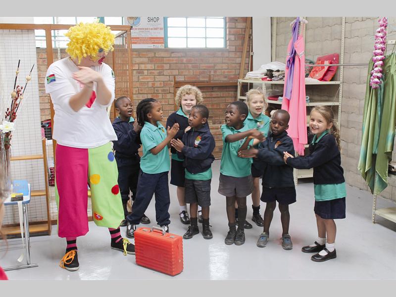 Blienkie the Clown (Arno Meyer) provides entertainment with the help of the El Baruch Academy pre-school learners during the opening of the El Baruch Charity Shop in Levubu. The opening ceremony was held on Friday.