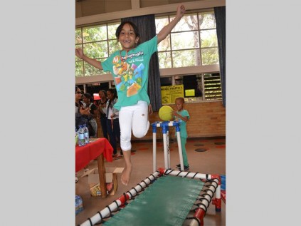 Aleeyah Hassim participates in some of the activities during Monkeynastix's prize-giving ceremony.
