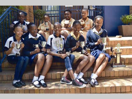 Pemps' top achievers show off the awards they won for their hard work. In front are Mary-Grace Whitehead, Nkako Chokoe, Munaka Munyai, Hope Mpyana and Modiegi Motswaledi. In the back are Ashley Mabunda, Mosa Moganwa, Bonolo Maponya and Refiloe Raphasha.