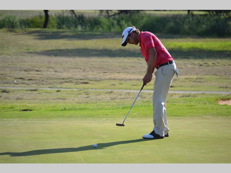 Hilton hughes, overall winner of the Polokwane Open putts on the 18th hole.