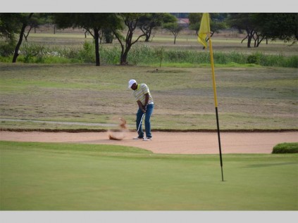 Willy Moshoeu in action during Leda's charity golf day at the Polokwane golf club last Thursday.