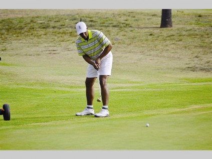 Thomas Southon putts for a birdie at Leda's charity golf day at the Polokwane golf club last Thursday.