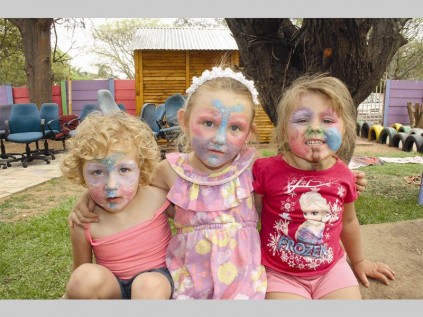 Kaylee Brits, Chloé van Tonder and Cailen Voges show off their painted faces.