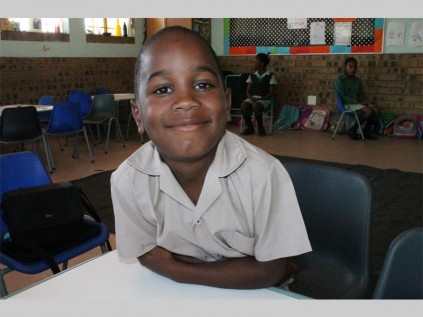 Seven-year- old John Buys says he has the best gr. R teacher, because she taught him shapes and colours. "I can identify different shapes and in our classroom my teacher has different shapes in different colours on the wall."