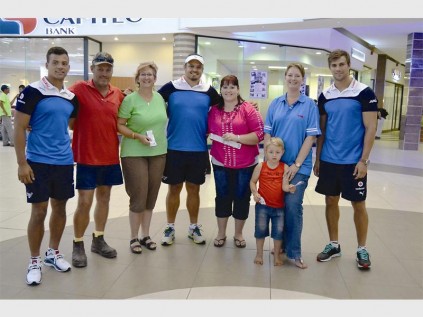 Vodacom Bulls players congratulate the double ticket competition winners: Duncan Matthews (Vodacom Bulls), Berry Rupping, Stella Steinberg, Morne Mellett (Vodacom Bulls), Chantel Nel, Francois and Isobel Bresler and JJ Engelbrecht (Vodacom Bulls). The winners won tickets to watch the Vodacom Bulls and Toyota Cheetahs match.