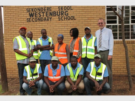 Jimmy Steele (Westenburg Secondary School, acting principal) thanks the team from Far North Cleaning and Pest Control for cleaning the school premises.