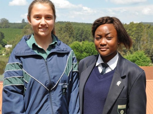 Rita Costa Moreira (Best Girls Soccer Player) and Mabule Matjie (Most Improved Girls Soccer Player).