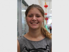 Rozani Maree spends Christmas Day with her family by celebrating together and giving presents to each other to show appreciation for one another.
