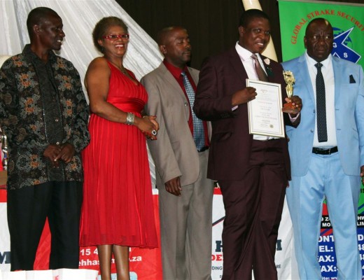 MJ Motsili is rewarded for being the best Accounting educator of the year. With him is MR Mongae, LS Tema, MJ Mathobela and MJ Ralekgokgo.
