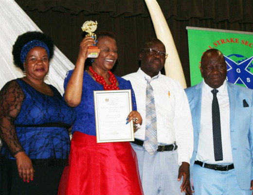 NM Masekwaneng celebrates with RG Mogotlane who is crowned for being the best educator in Afrikaans SAL. With them is MP Somo and MJ Ralekgokgo