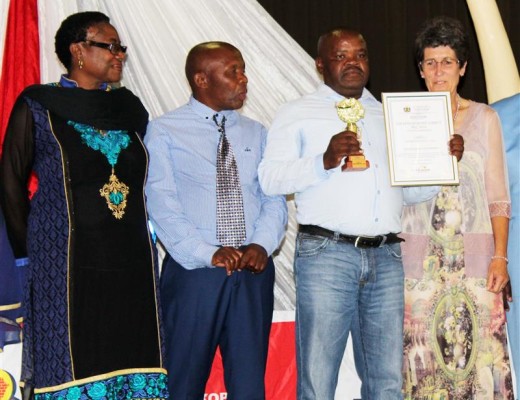 MR Manamela, MH Seabela and GF Snyman is gladly watching how LJ Chidi hold his certificate for best educator in Business Studies.