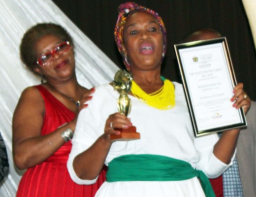 RLG Mokhonoana is awarded for being the best educator in Geopgraphy. With her is LS Tema.
