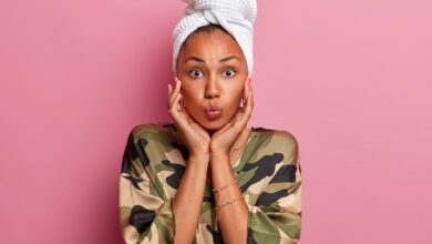 Portrait,Of,Lovely,Dark,Skinned,Woman,Touches,Face,Pampers,Skin