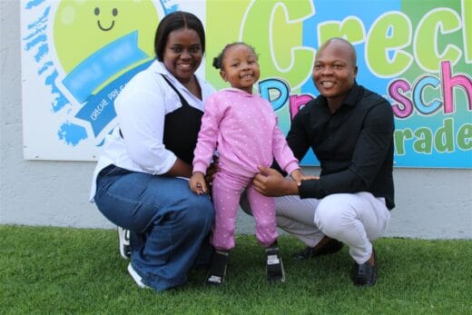 Leano Langa in the middle with her mom, Nomphi (left) and dad, Helder (right).