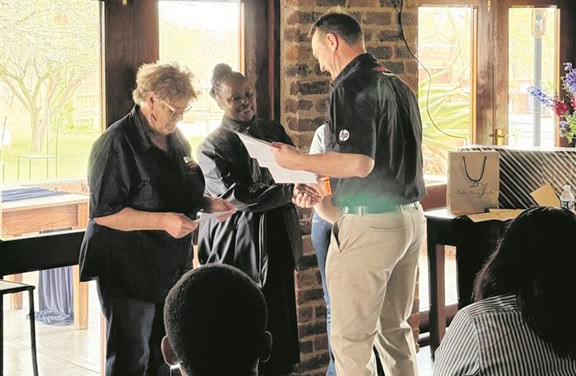 15 Years plus employees with their certificates (Medium)