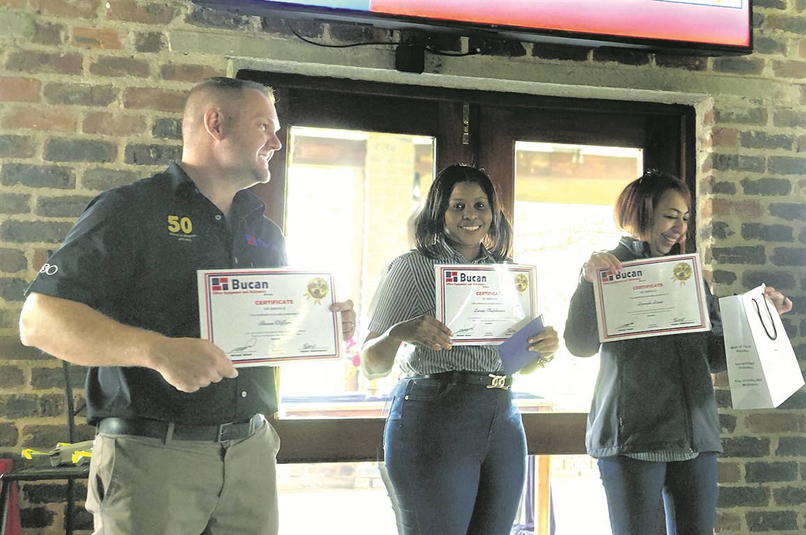 20 Years plus employees with their certificates (Medium)