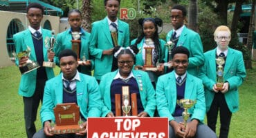 Jabez's top High School achievers pose with their trophies.