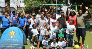The Soccercise Starz team with players and teachers rejoice after the prize-giving ceremony.