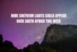 Feature image for an article about the rare Southern Lights (Aurora Australis) being visible over South Africa. The photo shows a magnificent night sky filled with vivid purple and pink hues, suggesting an aurora display, above a dark, rugged mountain peak. Large white text is overlaid: "RARE SOUTHERN LIGHTS COULD APPEAR OVER SOUTH AFRICA THIS WEEK".
