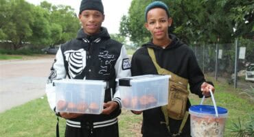 The Tshabalala brothers Donavan and Kutlwano sell baked products in the streets to make profit.