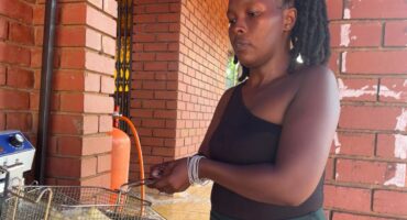 A woman prepares local food