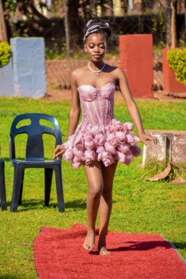 A model showcases a custom made dress.