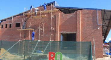 Contractors working on a building.