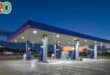 An empty gas station at dusk.