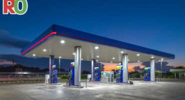 An empty gas station at dusk.