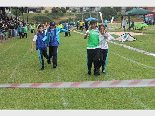 Pupils have fun during the paired race.