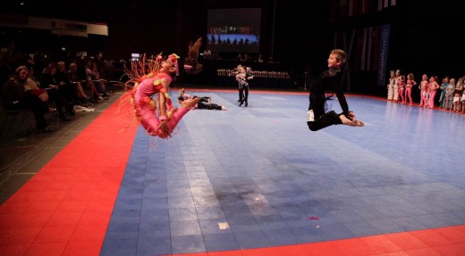Kerry and Mike show off their dance moves on a world stage.