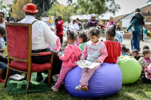 Children enjoying a good story at the Readathon pop-up library