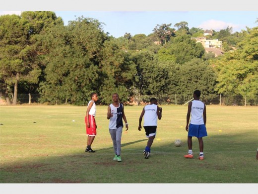 Melville United FC players gather at the Melpark Sports Complex in Melville on 19 November where they received their vests donation from Run/Walk for Life.